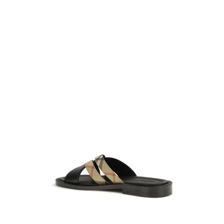 Sandali piatti Burberry in pelle di vitello nera Bos Taurus