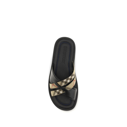 Sandali piatti Burberry in pelle di vitello nera Bos Taurus