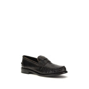 Mocassins à enfiler Prada en cuir de veau noir