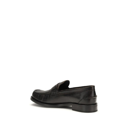 Mocassins à enfiler Prada en cuir de veau noir
