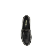 Mocassins à enfiler Prada en cuir de veau noir