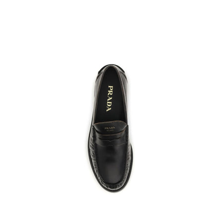 Mocassins à enfiler Prada en cuir de veau noir