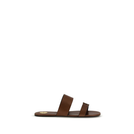 Sandali piatti Bos Taurus in pelle di vitello marrone Saint Laurent