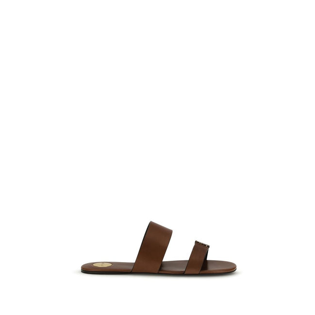 Sandali piatti Bos Taurus in pelle di vitello marrone Saint Laurent