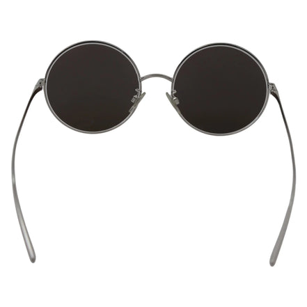 Round black lens sunglasses with thin silver metal frame on white background