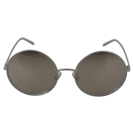 Round metal frame sunglasses with dark tinted lenses, modern luxury eyewear