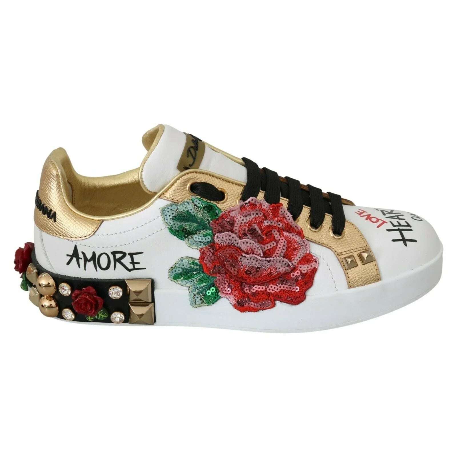 White and gold designer sneaker with sequin red rose embroidery, studs, and black laces