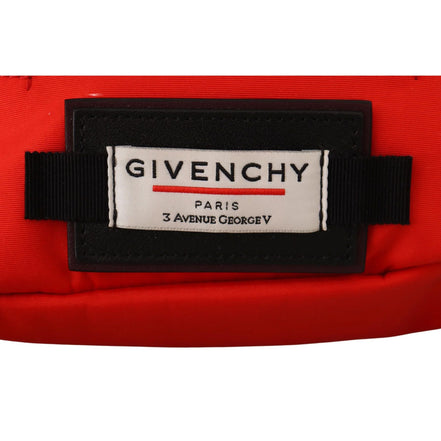 Close-up of Givenchy Paris logo patch on a red designer bag