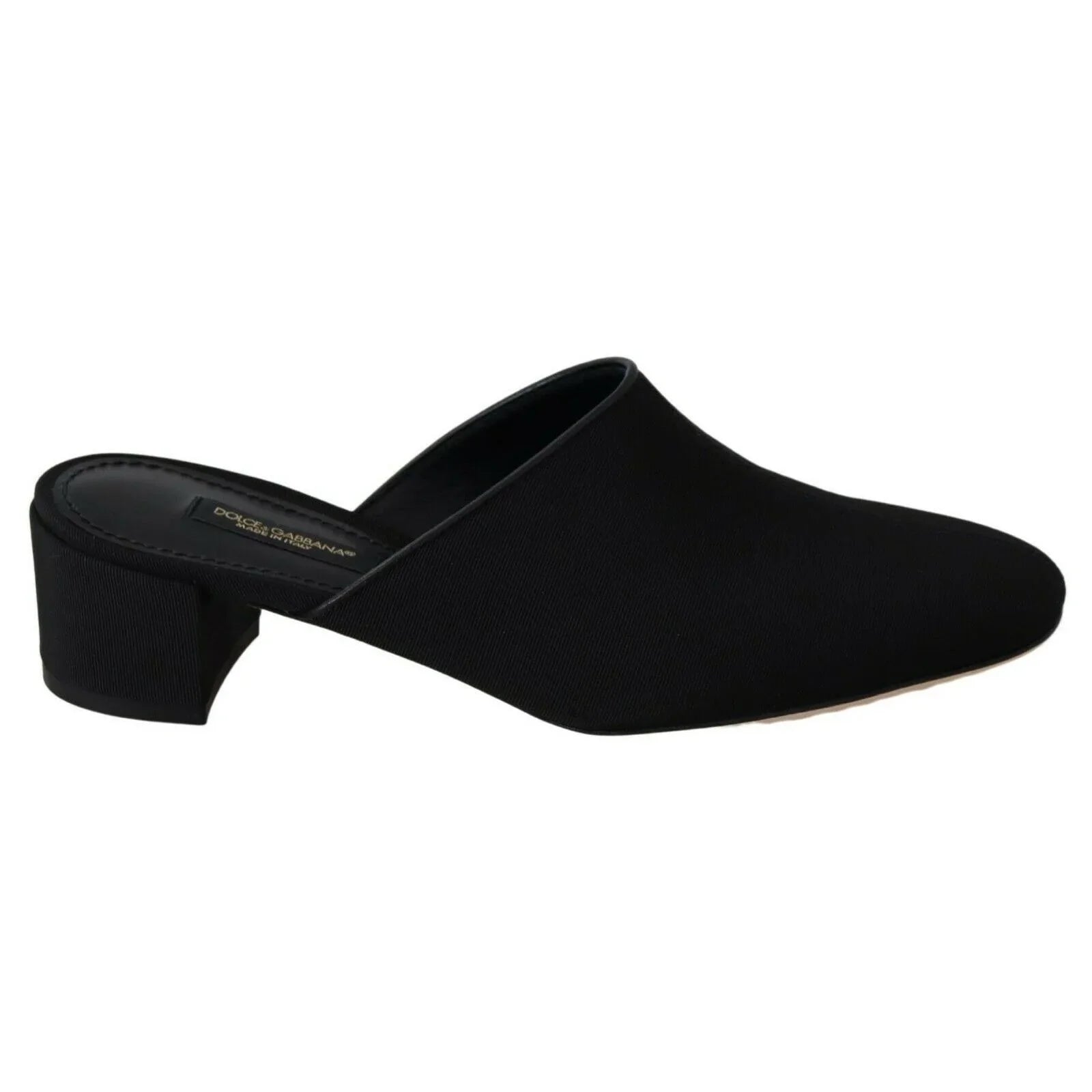 Black mule shoe with low block heel, slip-on design, minimalist women's luxury footwear