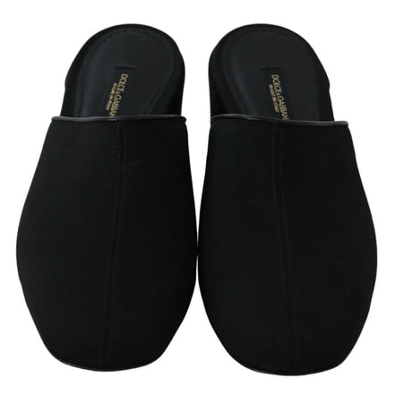 Pair of black Dolce & Gabbana slip-on mule slippers with closed toes, top view