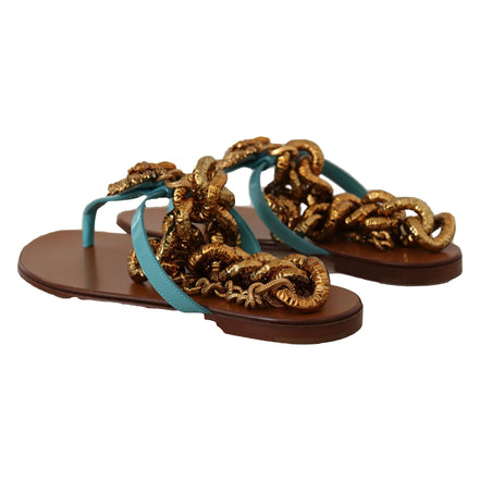 Women's flat sandals with turquoise straps and chunky gold chain embellishments