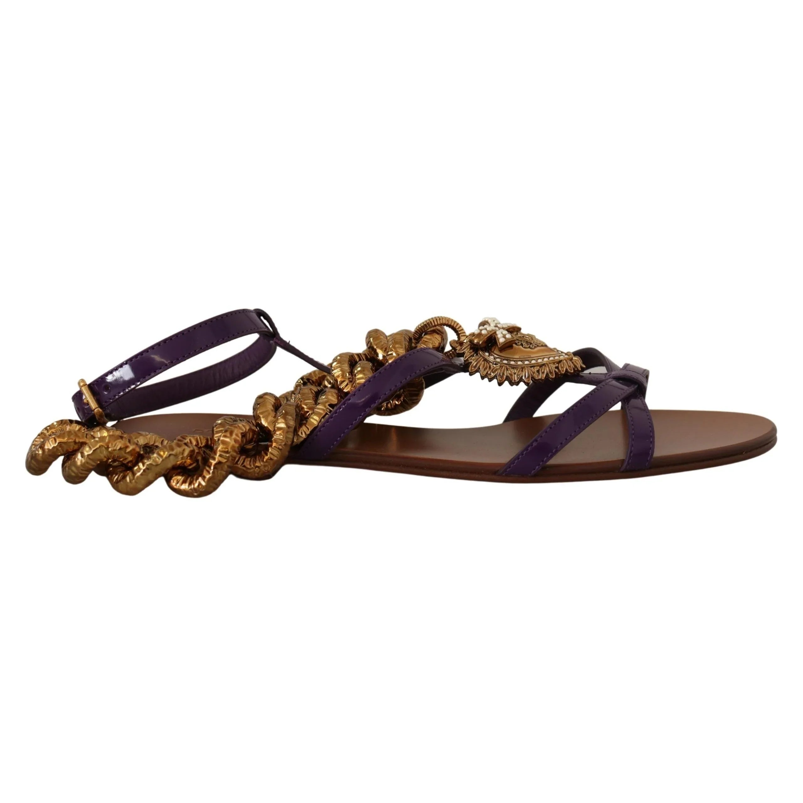 Purple leather sandal with gold chain embellishments and flat brown sole