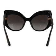 Occhiali da sole Dolce & Gabbana DG4326 polarizzati con paillettes nere e oro a farfalla