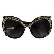 Occhiali da sole Dolce & Gabbana DG4326 polarizzati con paillettes nere e oro a farfalla