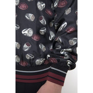 Dolce & Gabbana Maglione girocollo in seta nera con stampa ad anelli