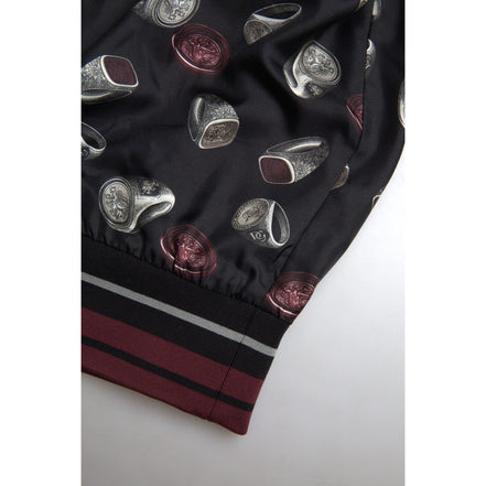 Dolce & Gabbana Maglione girocollo in seta nera con stampa ad anelli