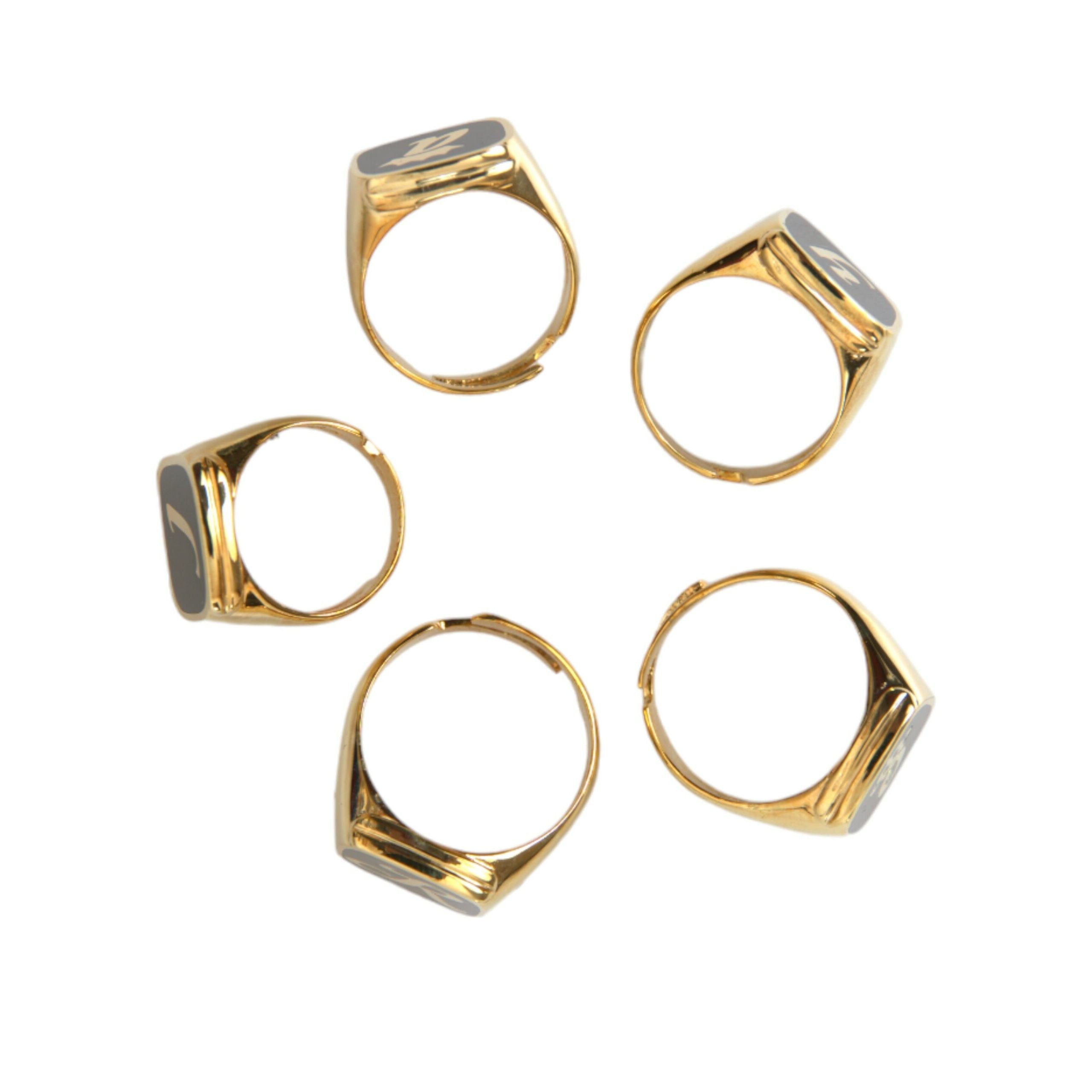 Lot de 5 bagues Dolce & Gabbana ROYAL en laiton doré et émail