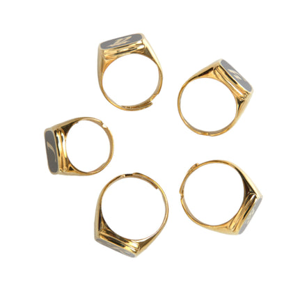 Lot de 5 bagues Dolce & Gabbana ROYAL en laiton doré et émail