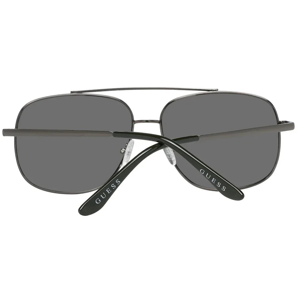 Black rectangular sunglasses with dark lenses and silver GUESS logo on temples