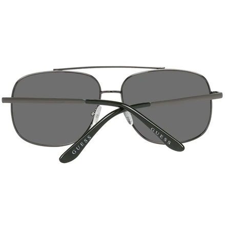 Black rectangular sunglasses with dark lenses and silver GUESS logo on temples