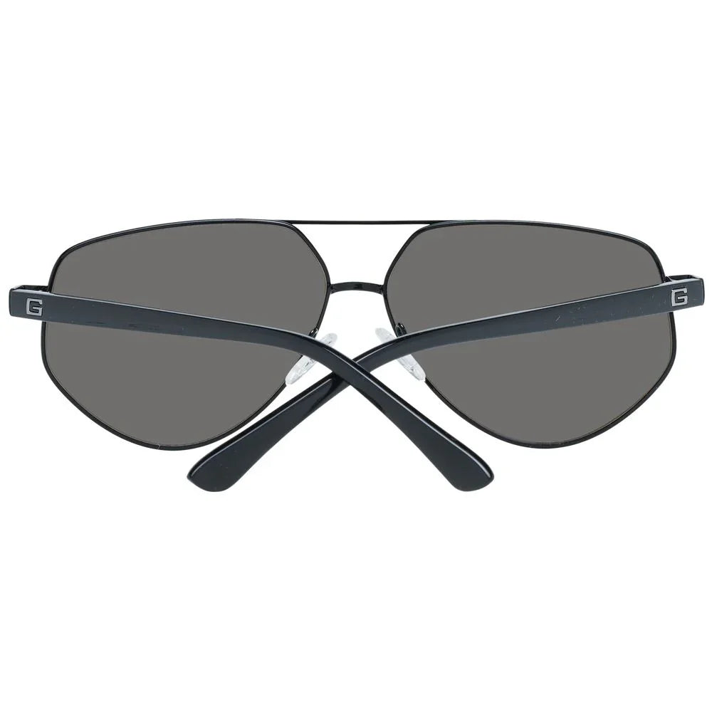 Black aviator sunglasses with dark lenses, metal frame, and G logo on arms