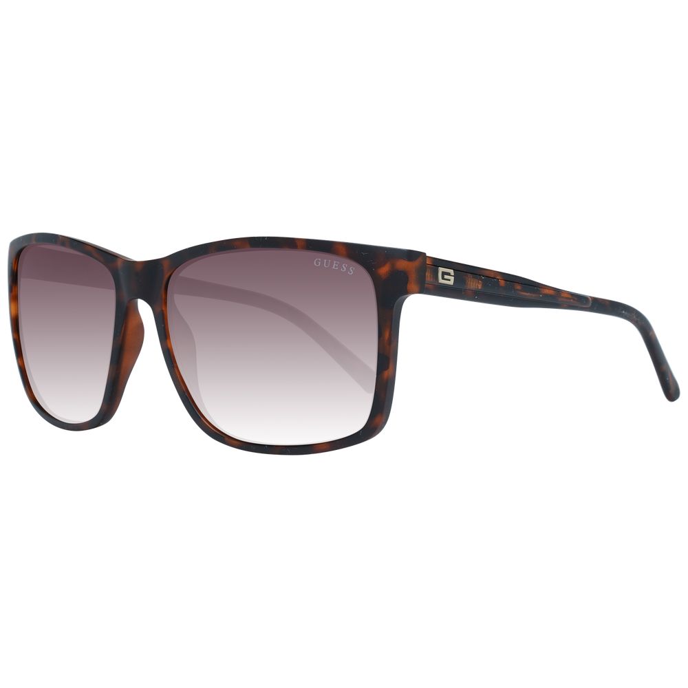 Occhiali da sole Guess in plastica marrone