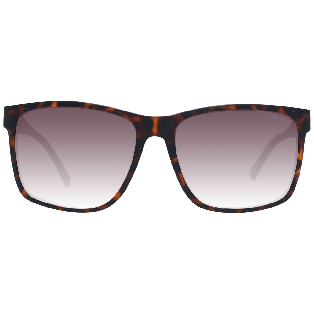 Occhiali da sole Guess in plastica marrone