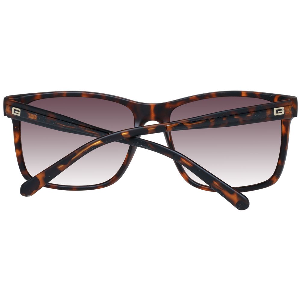 Occhiali da sole Guess in plastica marrone