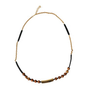 Pendentif Dolce & Gabbana en perles de bois noires et dorées avec logo