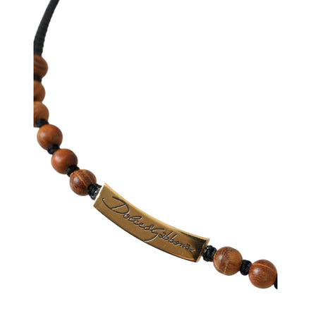 Pendentif Dolce & Gabbana en perles de bois noires et dorées avec logo