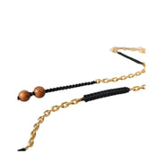 Pendentif Dolce & Gabbana en perles de bois noires et dorées avec logo