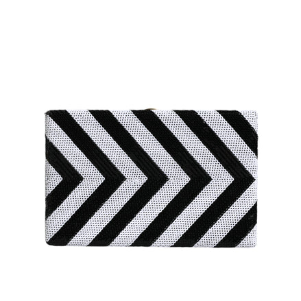 Pochette de soirée Dolce & Gabbana noire, blanche et dorée