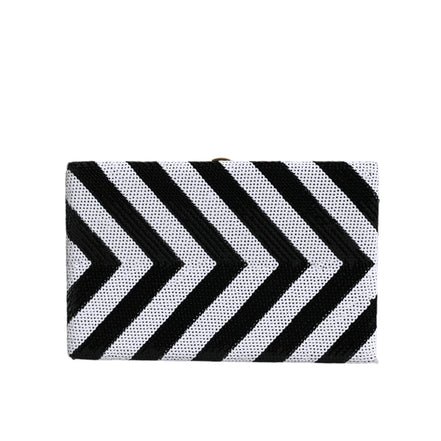 Borsa da sera/pochette Dolce & Gabbana con cornice oro, bianca e nera