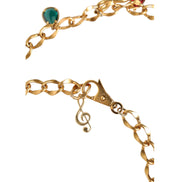 Cintura a catena da vita Dolce & Gabbana in ottone color oro con cristalli decorativi a tema frutta