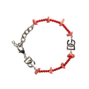 Bracciale a catena Dolce & Gabbana in ottone color argento con perline e logo DG in resina