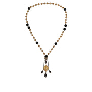 Collana Dolce & Gabbana stile rosario con perline nere e catena in ottone color oro