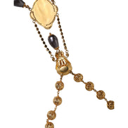 Collana Dolce & Gabbana stile rosario con perline nere e catena in ottone color oro