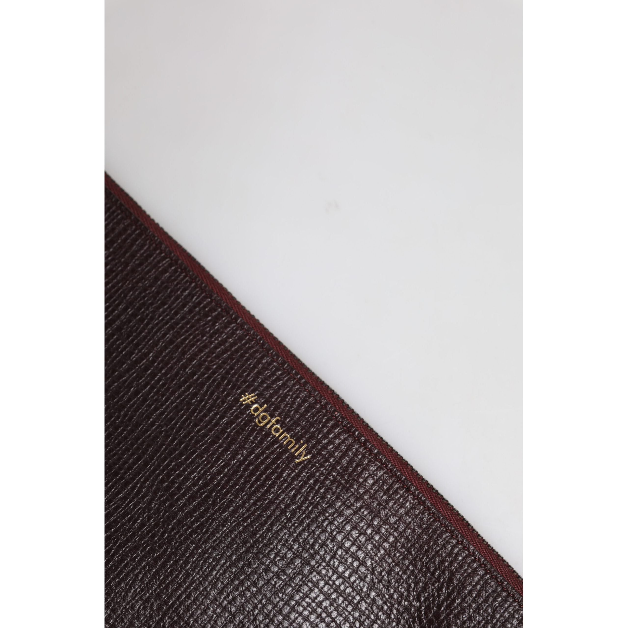 Pochette da uomo Dolce & Gabbana in pelle marrone con applicazioni #DGFAMILY