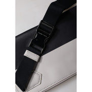 Sac bandoulière Dolce & Gabbana en cuir noir et blanc avec logo embossé