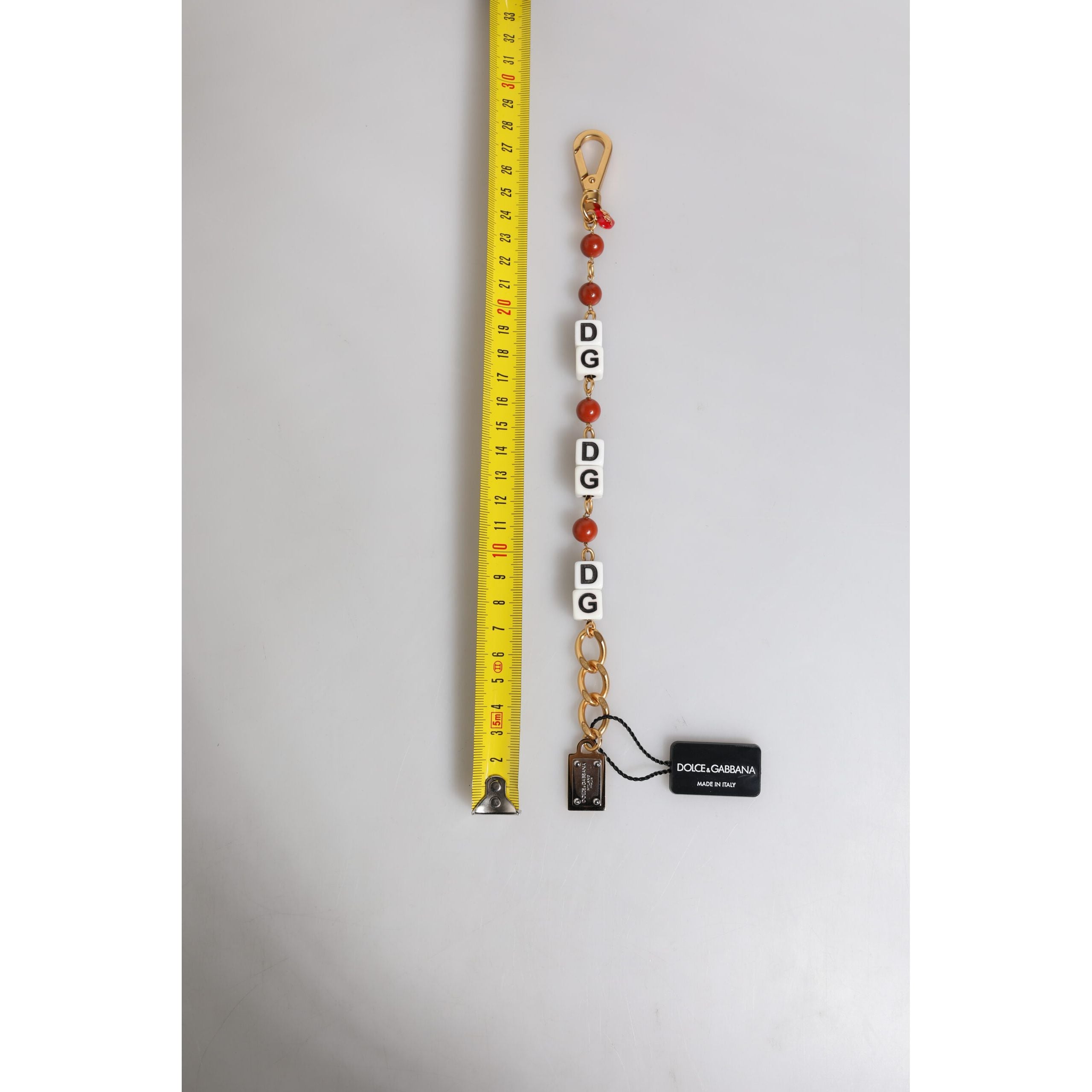 Dolce & Gabbana Bracciale Dadi con Logo DG in Catena di Ottone Dorato Multicolore