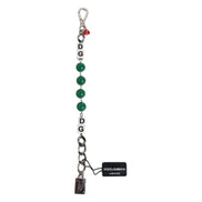 Bracciale con charm Dolce & Gabbana in ottone color argento, perline, dadi e logo