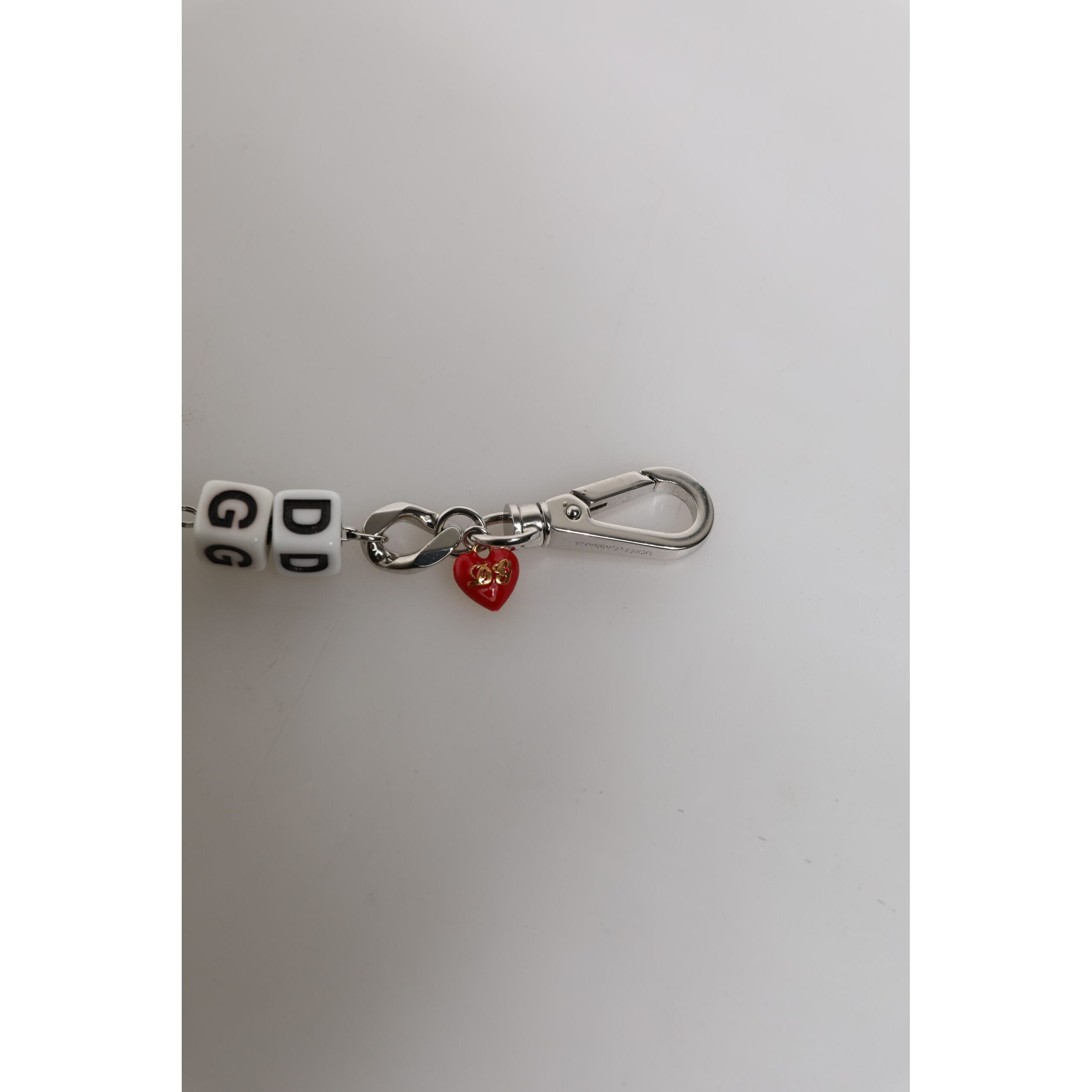 Bracciale con charm Dolce & Gabbana in ottone color argento, perline, dadi e logo