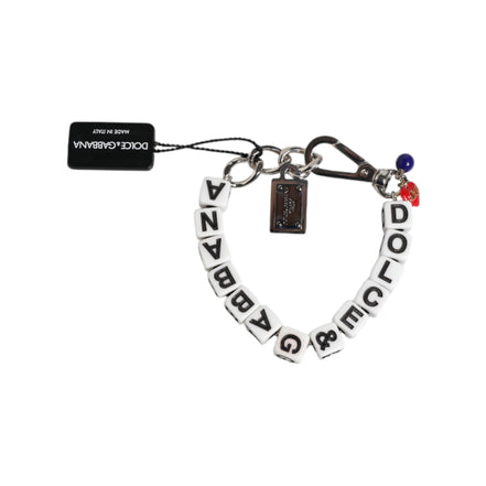 Bracciale Dolce & Gabbana con ciondolo a forma di dado in ottone color argento e logo