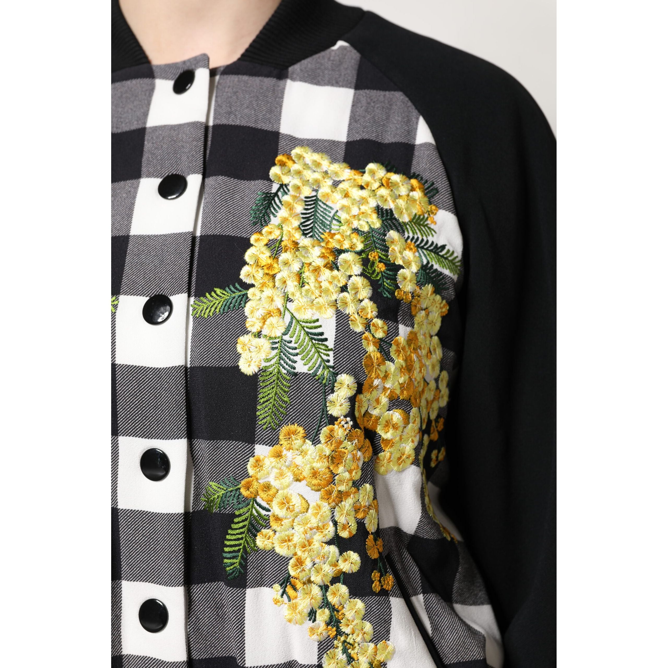 Dolce & Gabbana Giacca con bottoni a quadri bianchi e neri e motivo floreale