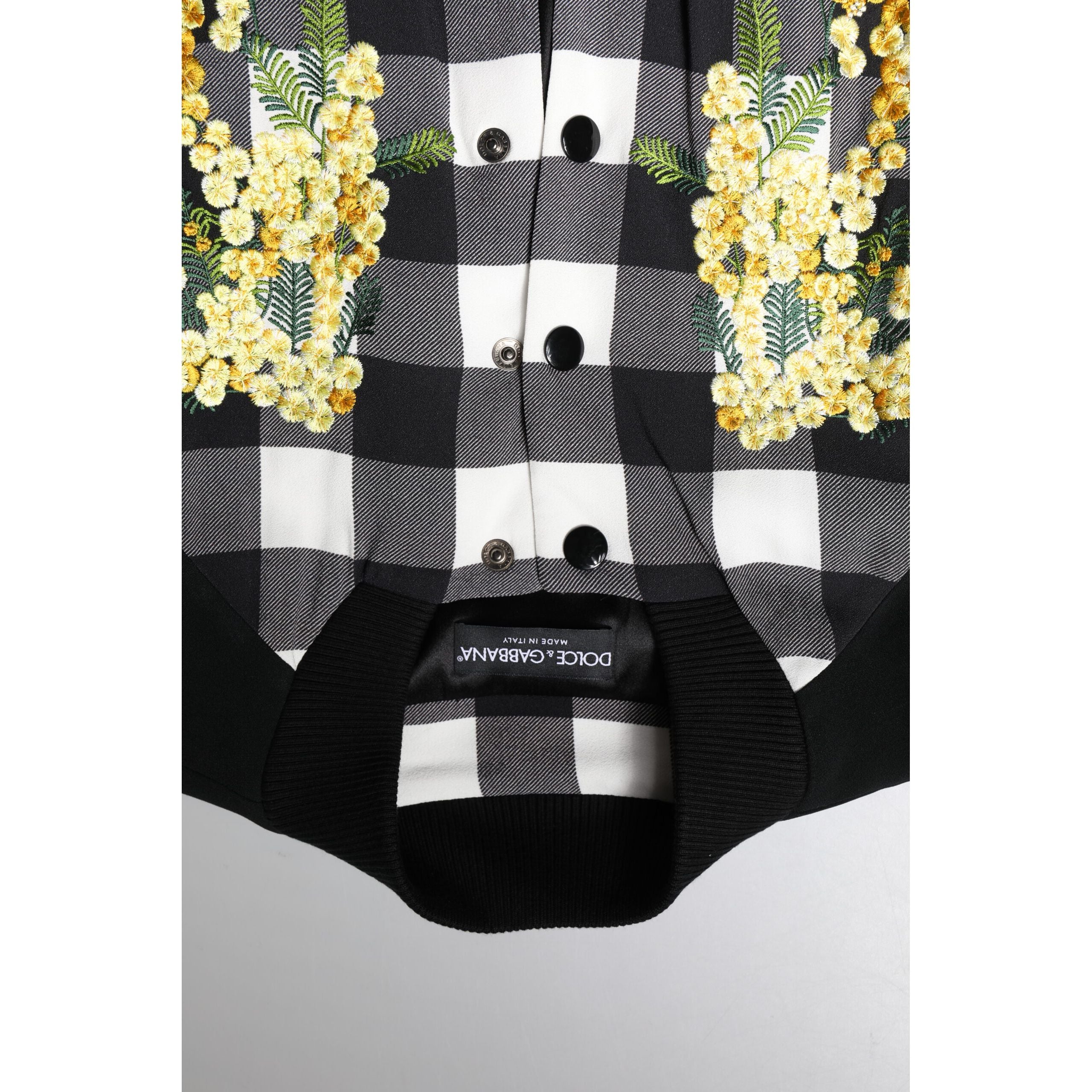 Dolce & Gabbana Giacca con bottoni a quadri bianchi e neri e motivo floreale