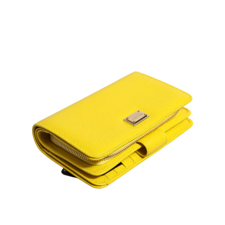 Portafoglio clutch continentale bifold in pelle gialla Dolce & Gabbana