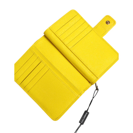 Portafoglio clutch continentale bifold in pelle gialla Dolce & Gabbana