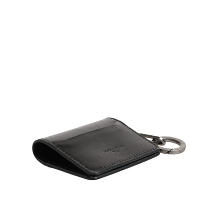 Portafoglio Dolce & Gabbana in pelle nera con logo in rilievo, portachiavi e porta carte di credito