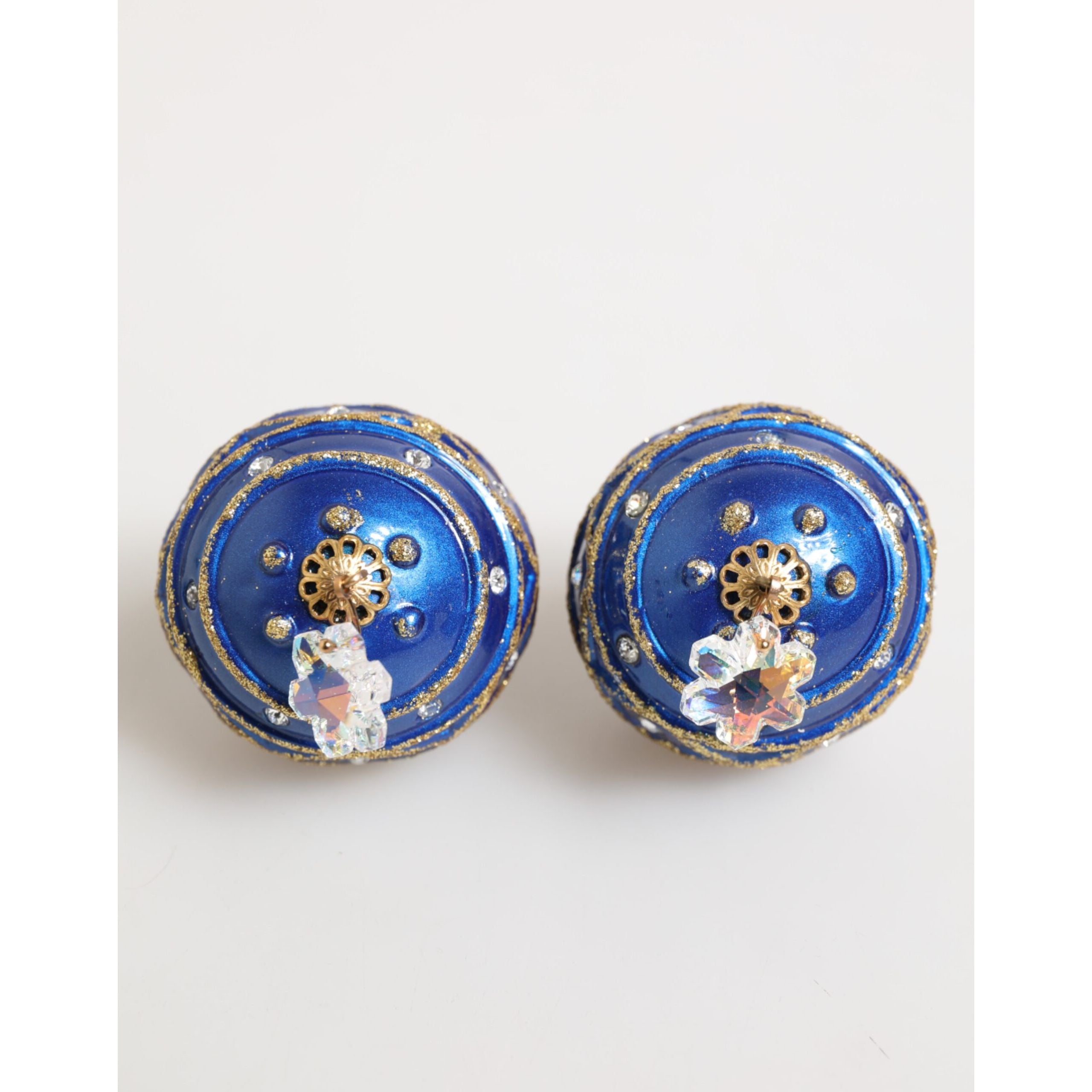 Boucles d'oreilles clips Dolce & Gabbana en laiton doré, boule de Noël bleue et cristaux.