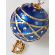 Boucles d'oreilles clips Dolce & Gabbana en laiton doré, boule de Noël bleue et cristaux.